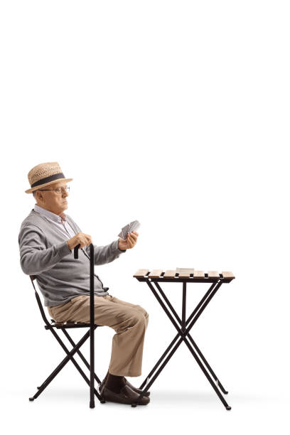 istock Elderly man playing cards by himself 1095372732