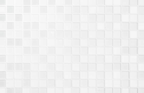 istock White or gray ceramic wall and floor tiles abstract background. 1095382880