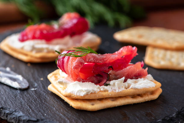 Appetizer cracker with salmon