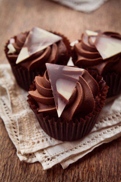 istock Selection of sweet dark chocolate cupcakes. 1095384964