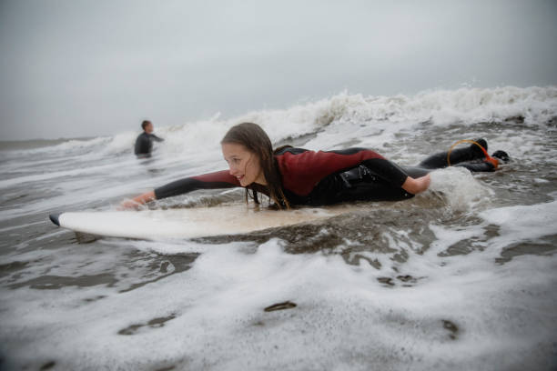 istock Paddling in the Surf 1095396866