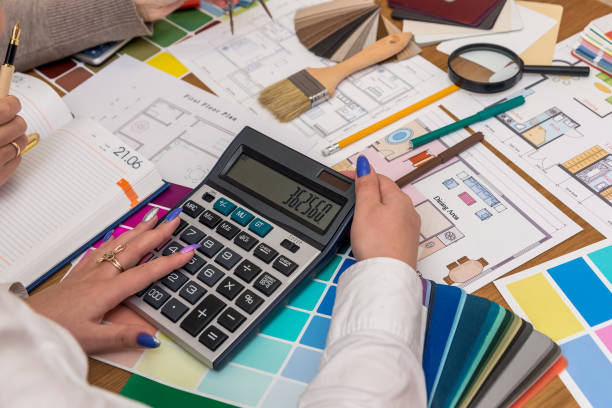 istock Teamwork of creative designers, calculations for project 1095401734