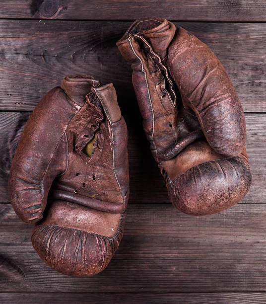 istock very old brown boxing gloves 1095404920