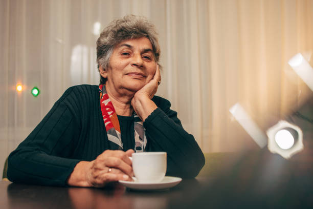istock Happy senior lady enjoying in coffee 1095405364