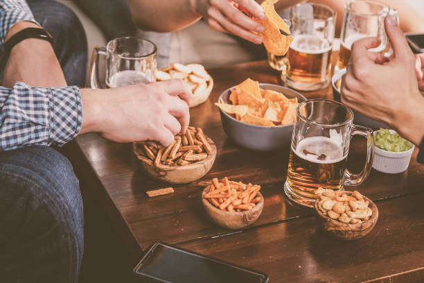 istock Young people at a beer party with snacks 1095405996