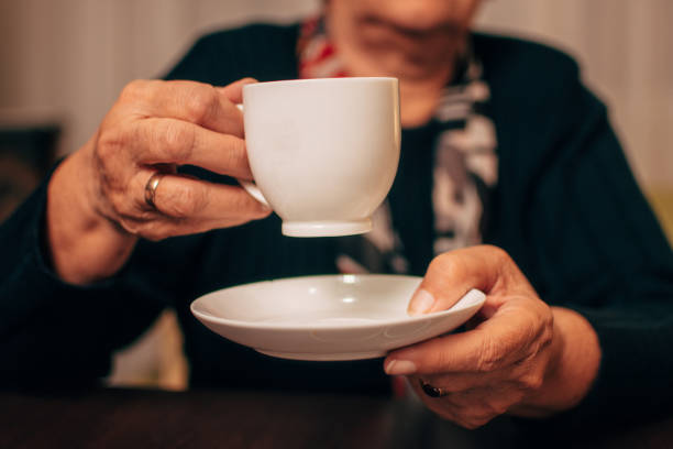istock Happy senior lady enjoying in coffee 1095410846
