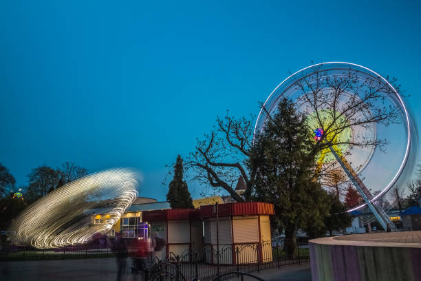 istock Amusement rides at an amusement park long exposure 1095412502