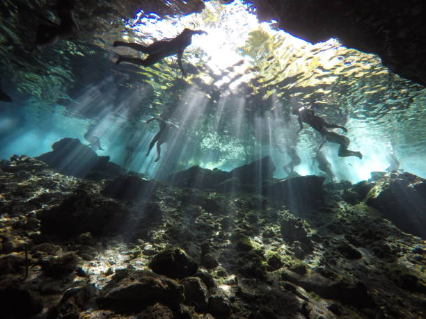 istock Cenote swimming in Cancun, Mexico 1095414352
