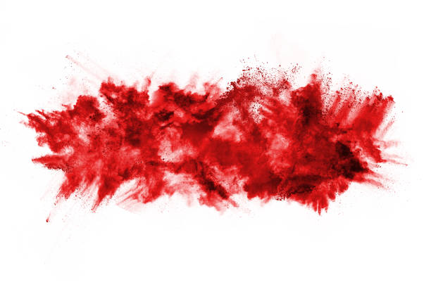 istock Freeze motion of red powder exploding, isolated on white background. Abstract design of red dust cloud. Particles explosion screen saver, wallpaper 1095420488