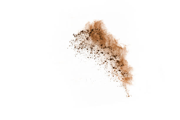 istock Brown powder explosion isolated on white background. 1095421696