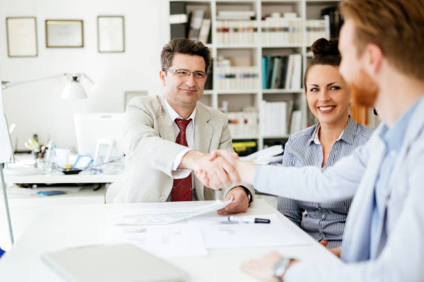 istock Group of business people working as team in office 1095422808