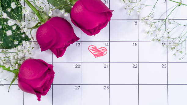istock Drawing a heart for Valentine's Day on Calendar 1095422904