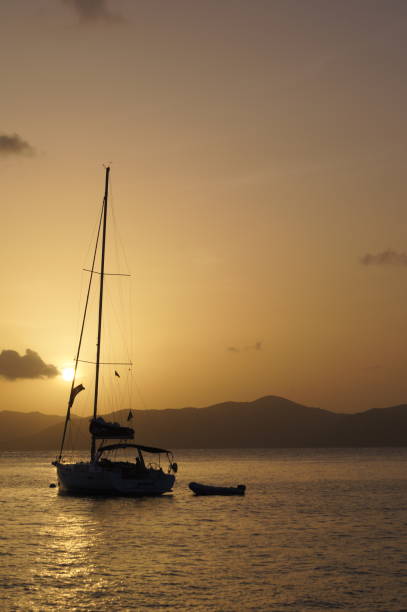istock Sailboat at Sunset in the British Virgin Islands 1095426032