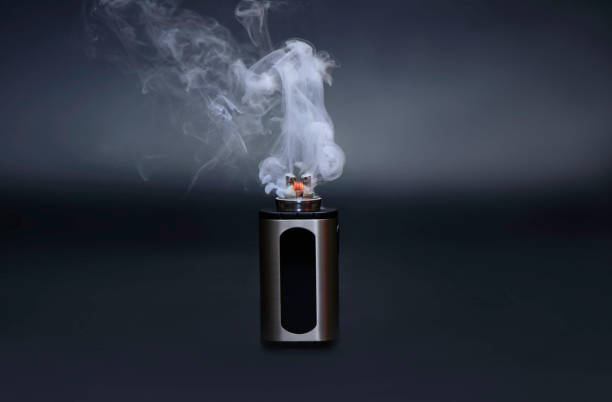 istock Electric cigarette in smoke 1095436334