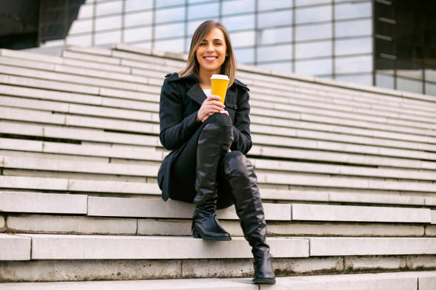 istock Businesswoman drinking coffee 1095452882