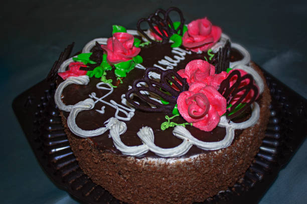 istock sponge cake with chocolate icing and butter cream 1095459804