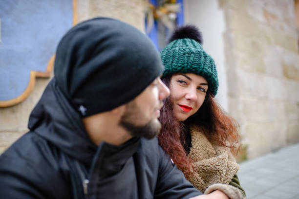 istock Cheerful young couple having fun in winter park 1095470688