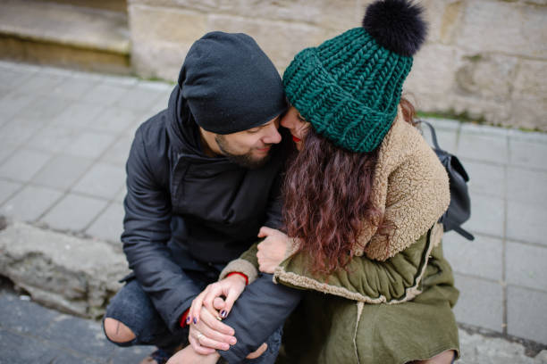 istock Cheerful young couple having fun in winter park 1095470748