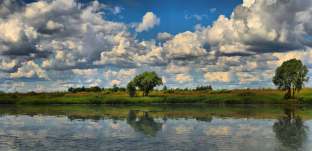 istock Panorama of a summer landscape with the river 1095473028