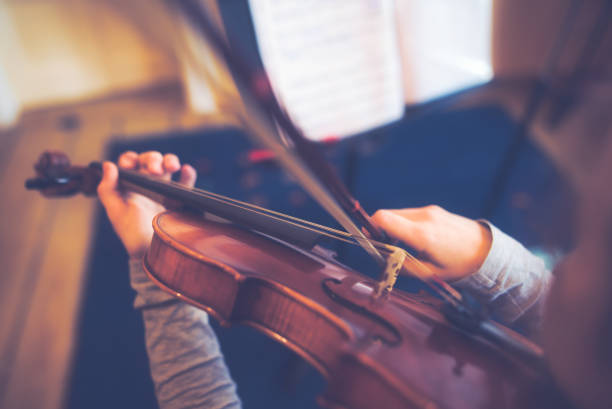 istock A little Anne-Sophie is practicing on her violin 1095473674