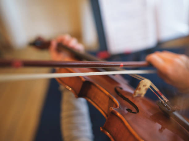 istock A little Anne-Sophie is practicing on her violin 1095474724