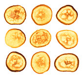 Homemade fried pancakes isolated on white background. Shrovetide, pancake week. Collection of fritters, top view