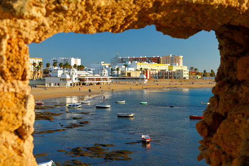 Old historic pier at the La Caleta Beach (Antiguo Balneario de la Palma). Cadiz, Andalusia, Spain