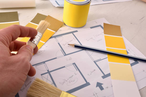 istock Designer working on interior home painting project elevated view 1095489506