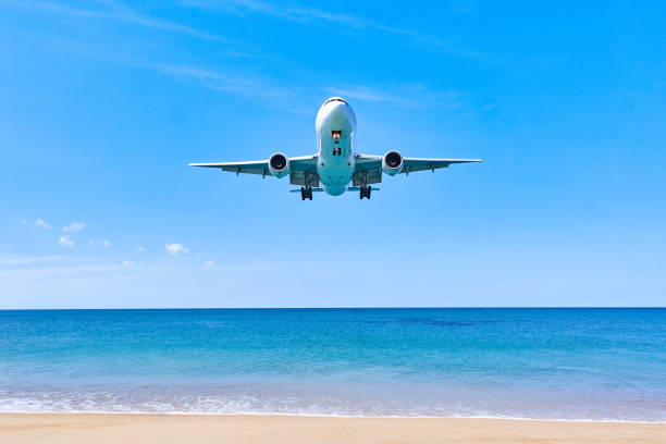 istock Plane is landing over water 1095490970