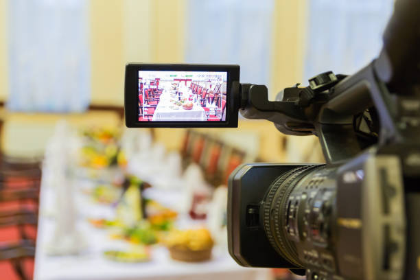 istock Video shooting at a restaurant at a Banquet. Camcorder with LCD display 1095495308