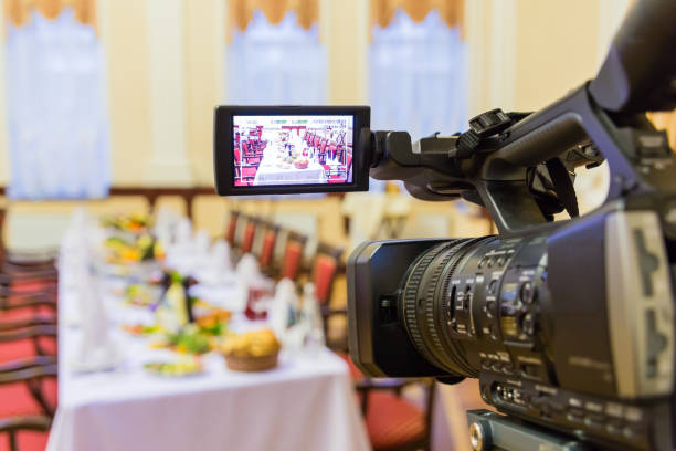 istock Video shooting at a restaurant at a Banquet. Camcorder with LCD display 1095495326