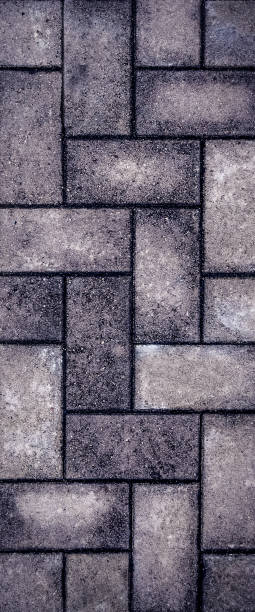 istock Background pavement, paving stone, brick, cobblestone, road, footpath. 1095496092