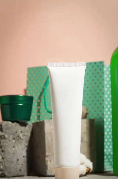 Moisturizer tube template, against the background cosmetics