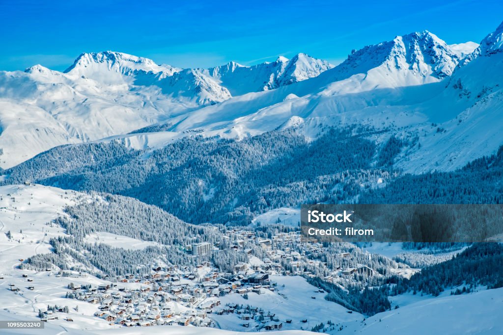 Arosa village from above Beautiful snow capped mountains surrounding Arosa village. Arosa Stock Photo