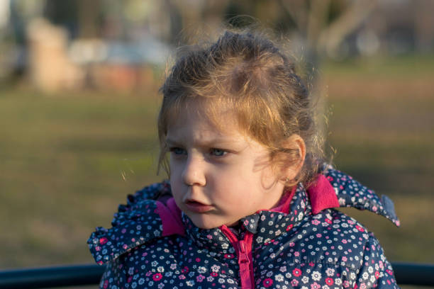 istock Portrait of a  grumpy little girl 1095507962