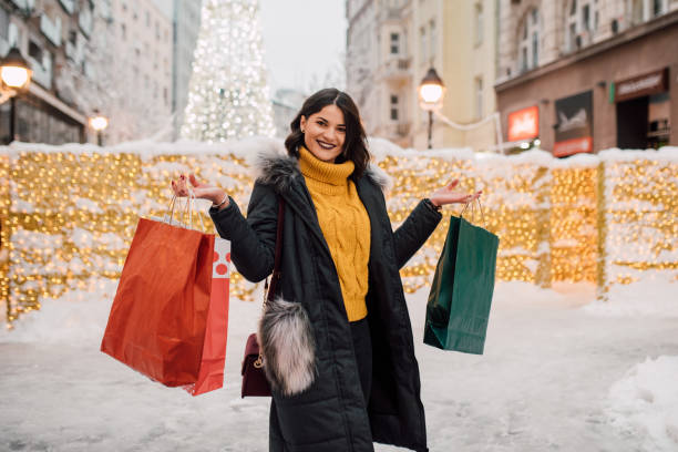 istock Girl returning from Christmas shopping 1095512504
