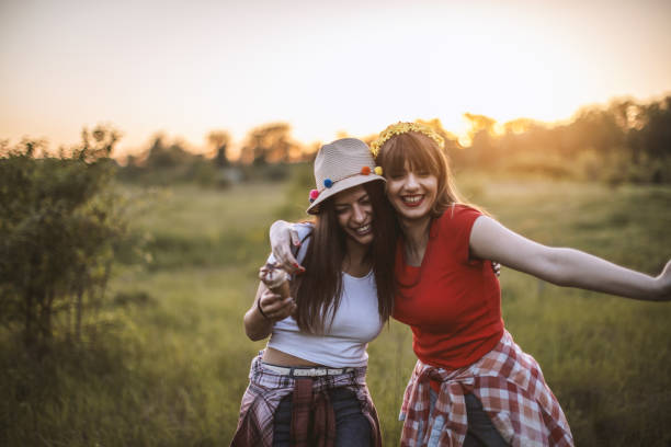 istock Happy friends enjoy in nature 1095514752
