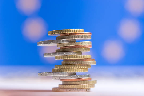 istock Euro coins stacked on each other in different positions 1095527814