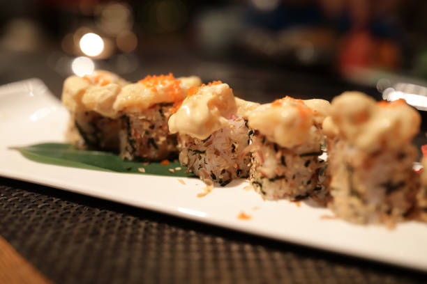 istock Uramaki Sushi rolls with tempura shrimp 1095537088