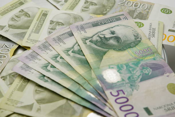 Serbian Dinar Money Close up footage of many Serbian dinar banknotes of 2000 and 5000 value. Two thousand and five thousand. dinar stock pictures, royalty-free photos & images
