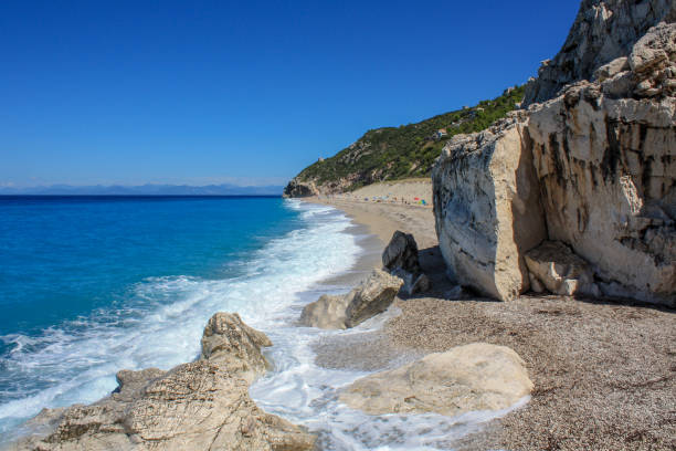 istock beautiful beach in front one big rock Lefkada island 1095551116