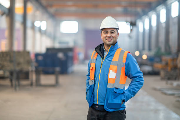 Portrait of a Factory Engineer Portrait of a Factory Engineer manufacturing occupation stock pictures, royalty-free photos & images
