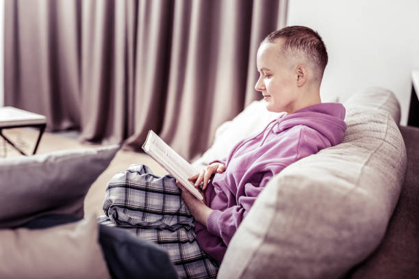 istock Positive delighted female sitting in semi position 1095557338