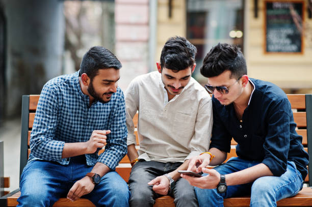 istock Group of three indian ethnicity friendship togetherness mans 1095571646