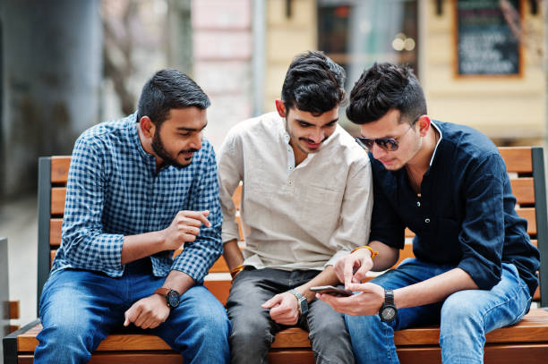 istock Group of three indian ethnicity friendship togetherness mans 1095571672