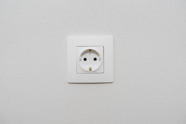 istock Alone outlet Electrical Socket on white baskgrounds.  copy space for text , renovation , new home ownership concept 1095575078