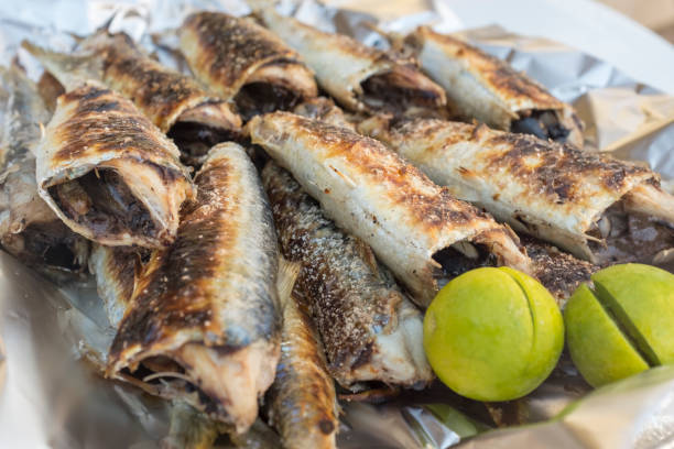 Grilled sardines in the fish souk, Salalah, Oman
