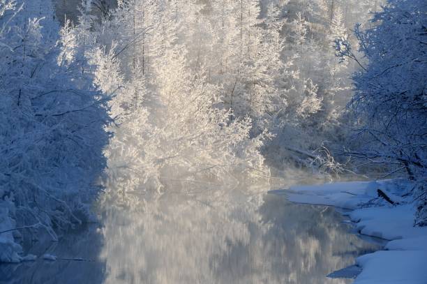 Non-freezing rivers in Oymyakon. Tomtor village, Yakutia. stock photo