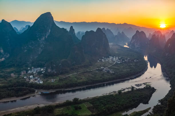 Sunrise over the Li River as seen from Xianggong mountain, Yangshuo, Guilin, China stock photo