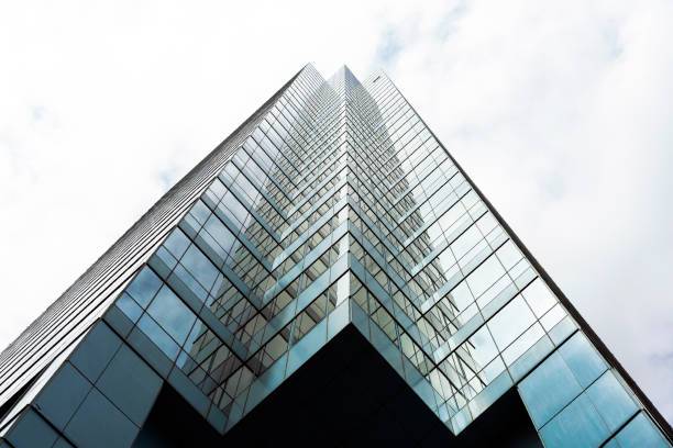 istock Low angle view of modern office building, background, copy space 1095594524